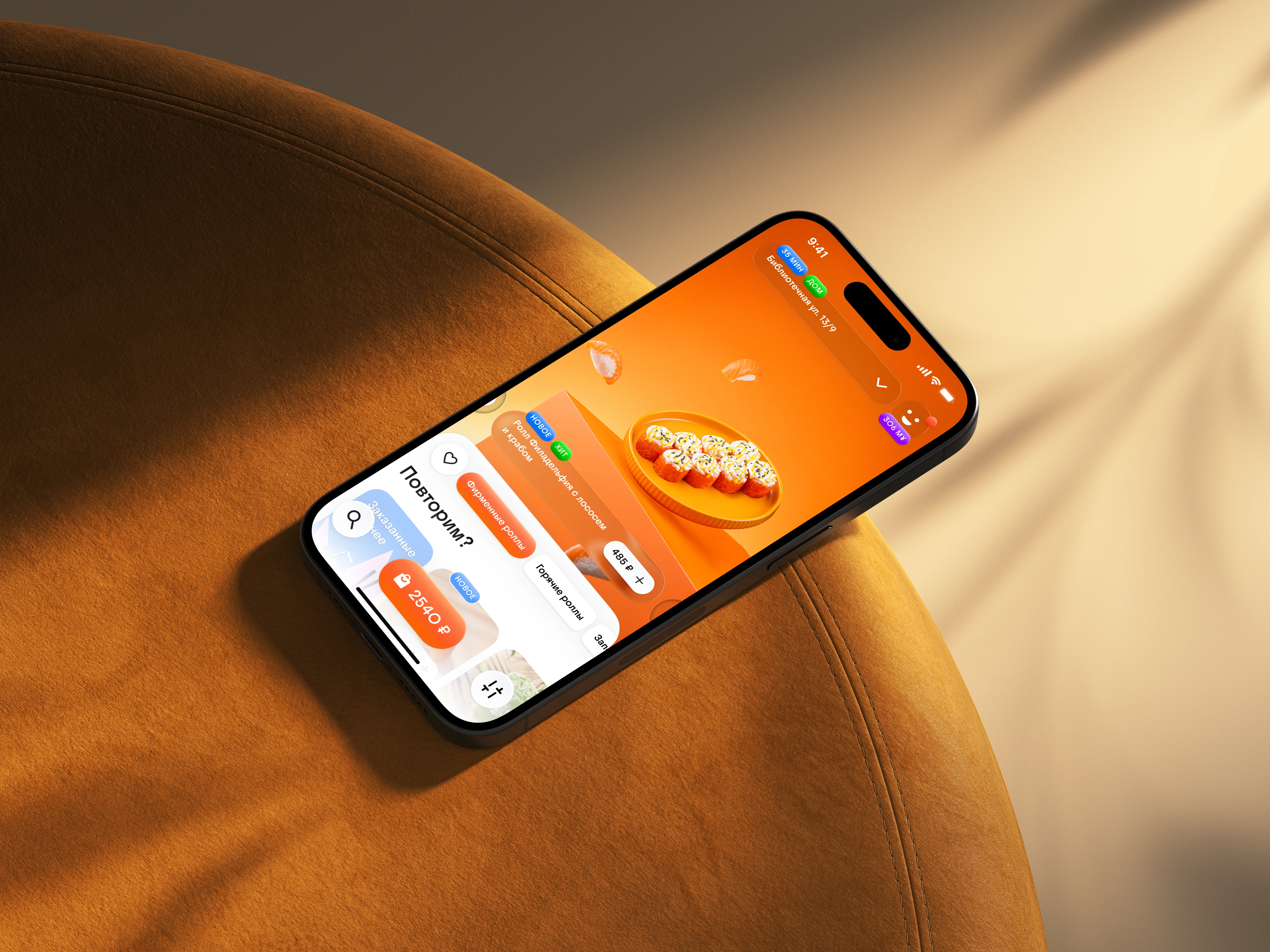 MYBOX app mockup on an orange chair, showing a sushi delivery product screen